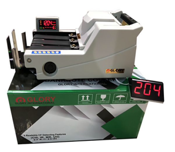 Máy đếm tiền GLORY dạng máy nằm đang được sử dụng phổ biến tại kho bạc nhà nước và ngân hàng